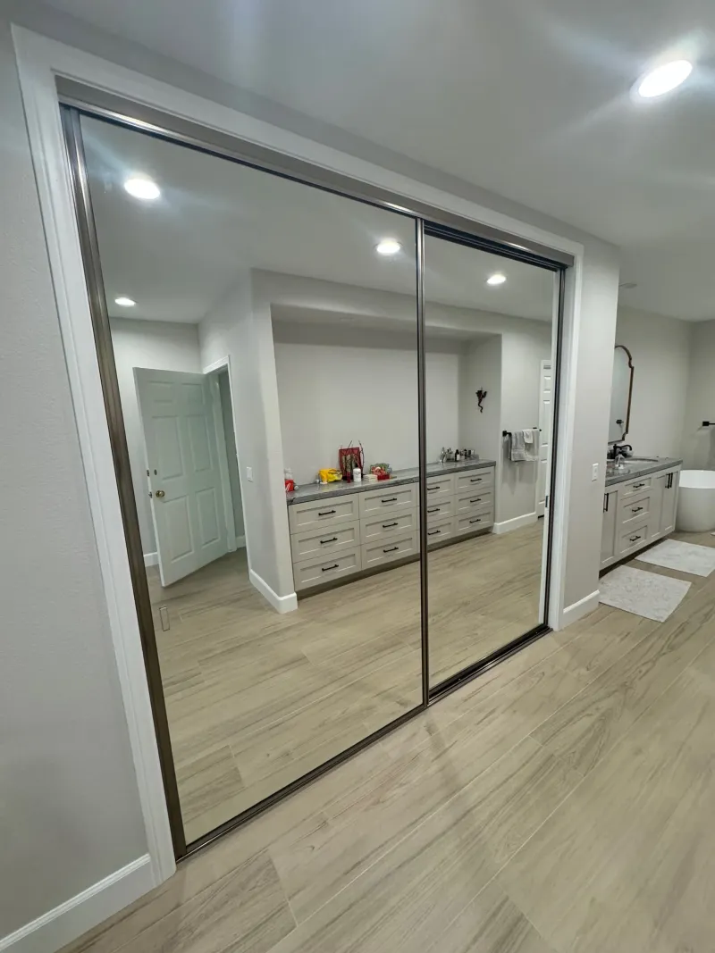 Open channel mirrored closet door
