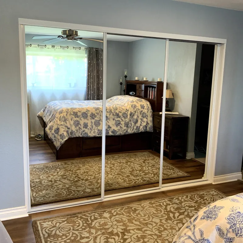 Open channel mirrored closet door