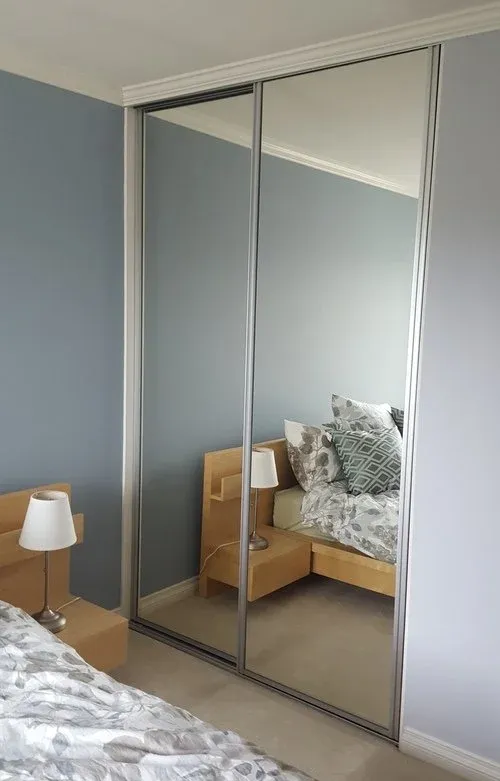 Open channel mirrored closet door