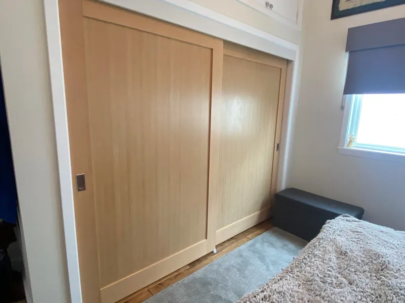 Stain-grade 1 panel shaker in vertical-grain Douglas fir sliding closet door