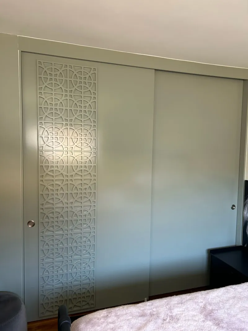 Flush door with applique sliding closet door