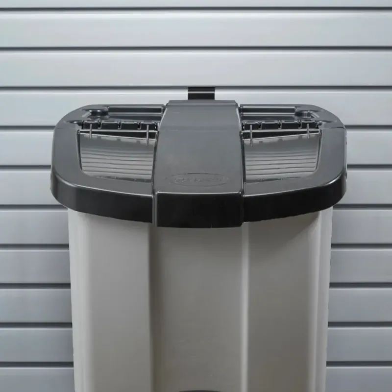 Wall-mounted storage bin for a garage slatwall system