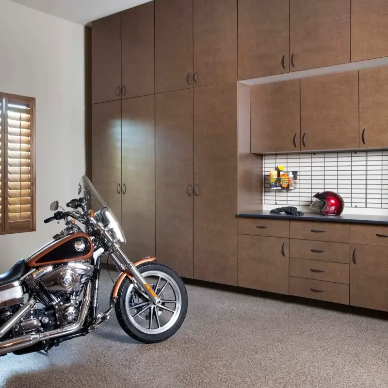 Custom garage storage — bronze extra tall cabinets inset, second angle