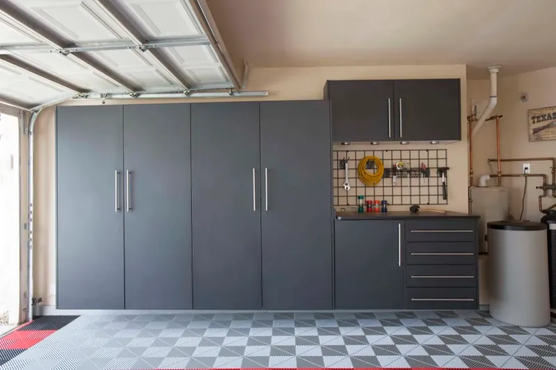 Custom garage storage — granite tall cabinets workbench