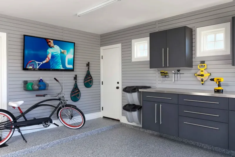 Custom garage storage — granite workbench stainless counter grey
