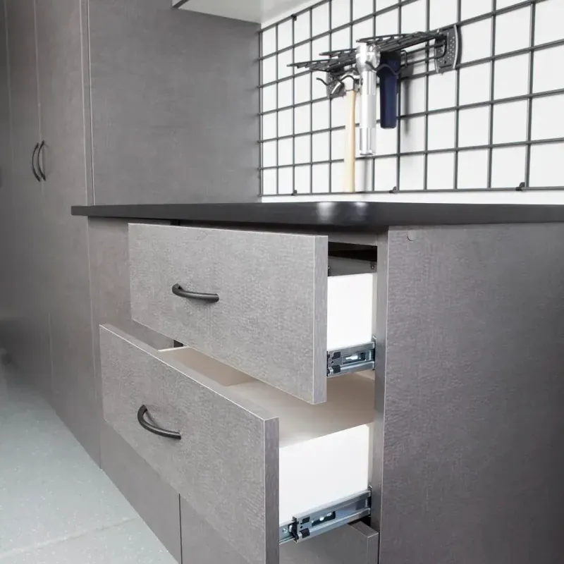 Custom garage storage — pewter workbench drawers