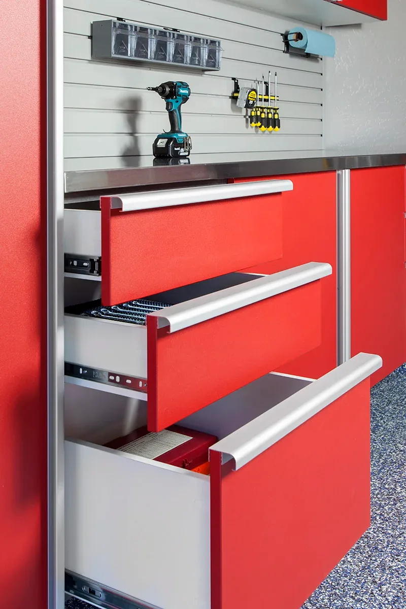 Custom garage storage — red drawers extruded handles