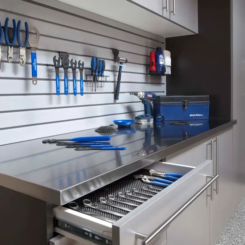 Custom garage storage — stainless workbench drawer gray slatwall