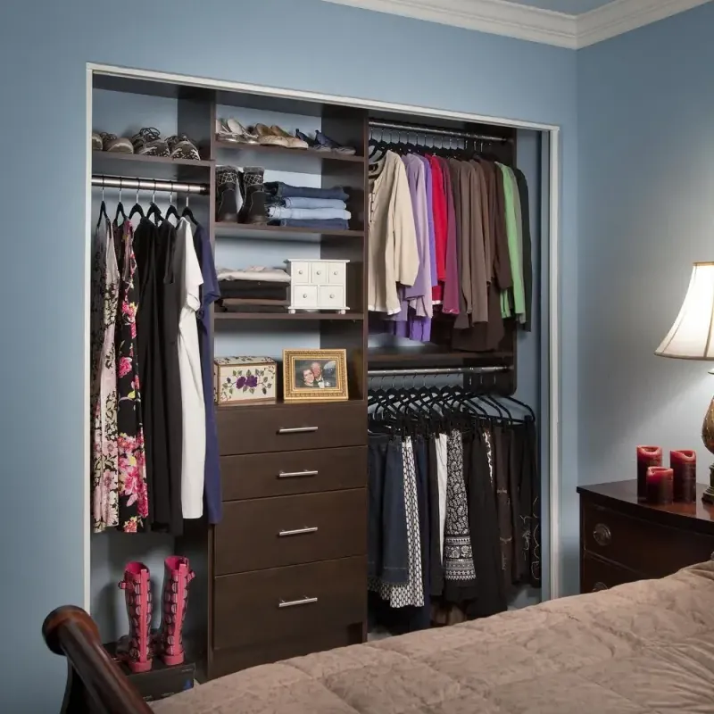 Guest bedroom reach-in closet organizer in chocolate pear finish with drawers