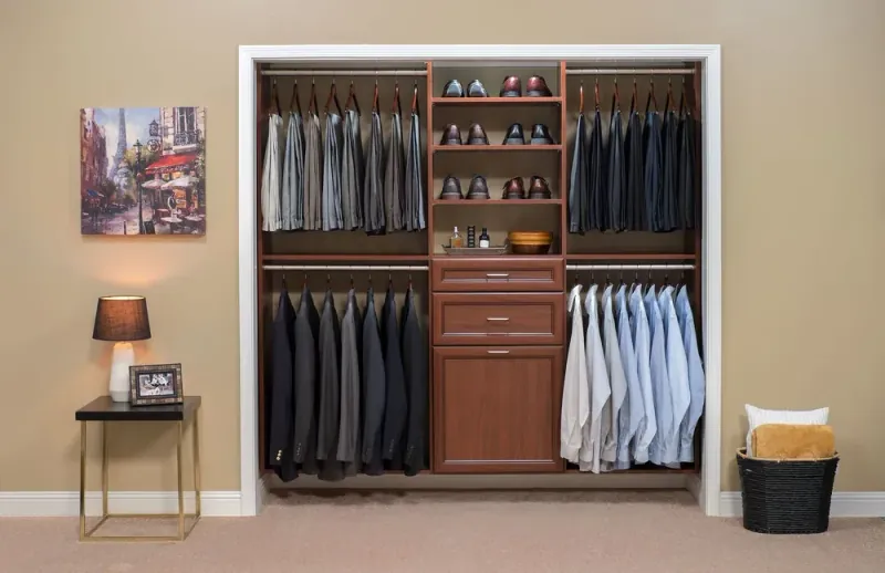 Cognac-finish reach-in closet with built-in shoe shelving, drawers and double hanging for men's clothing