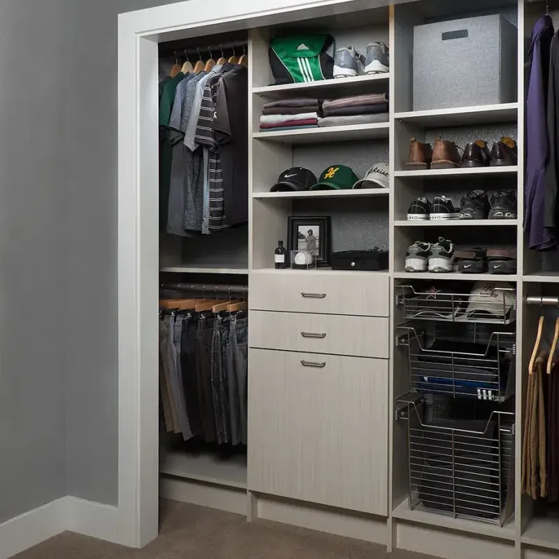Arctic flat-panel reach-in closet with pull-out wire baskets and shoe shelving, detail view