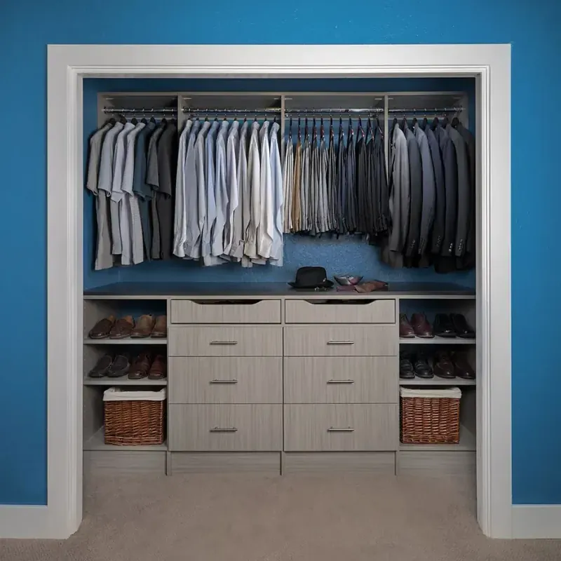 Concrete flat-panel reach-in closet with built-in dresser and double hanging for a men's wardrobe