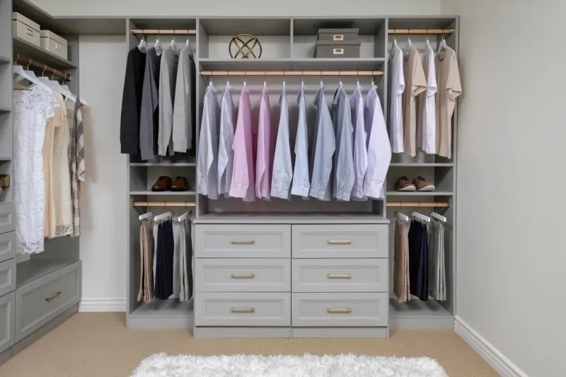 Cloud finish walk-in closet designed for a men's wardrobe